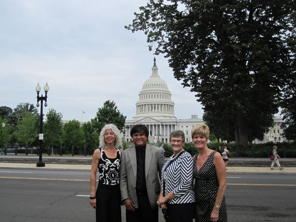 Colleen Coble posed in front of the White House